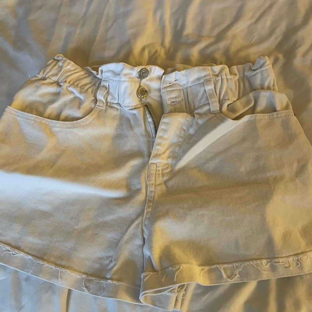 White fringe shorts